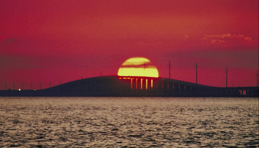 Florida's warm temperatures and scenic beaches attract families with children. Florida's warm temperatures and scenic beaches attract families with children.
