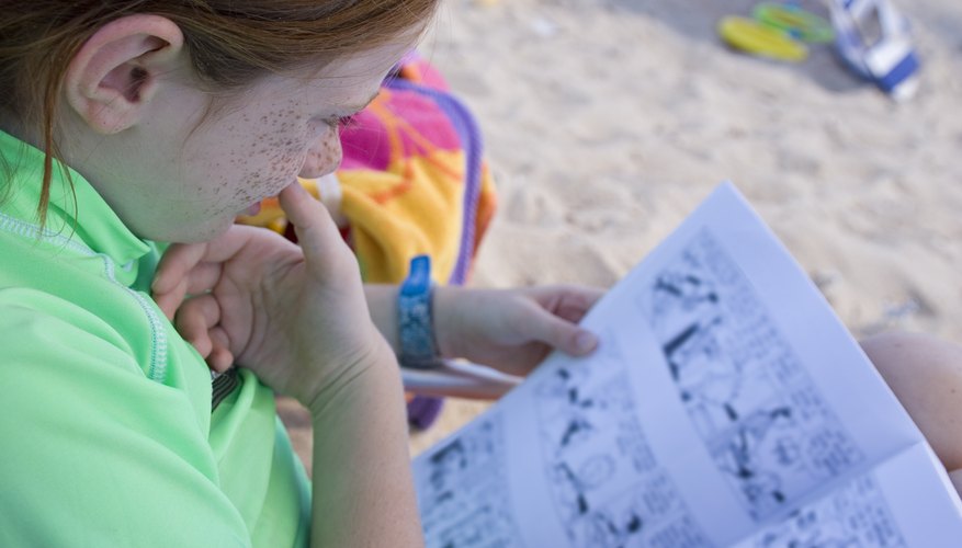 Child Reading on the Beach