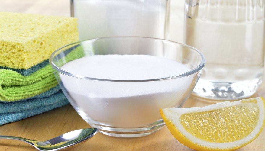 Photo Credit: Geo-grafika/iStock/Getty Images Bowl of sodium carbonate and lemon.