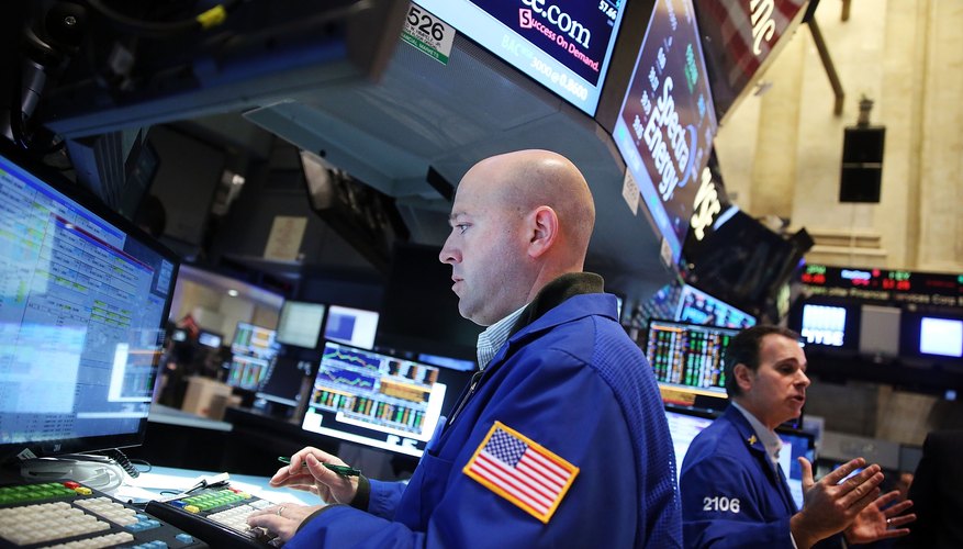 Stock trader on the floor of the New York Stock Exchange.