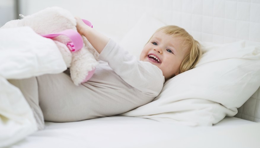 Toddler lying in bed Toddler lying in bed
