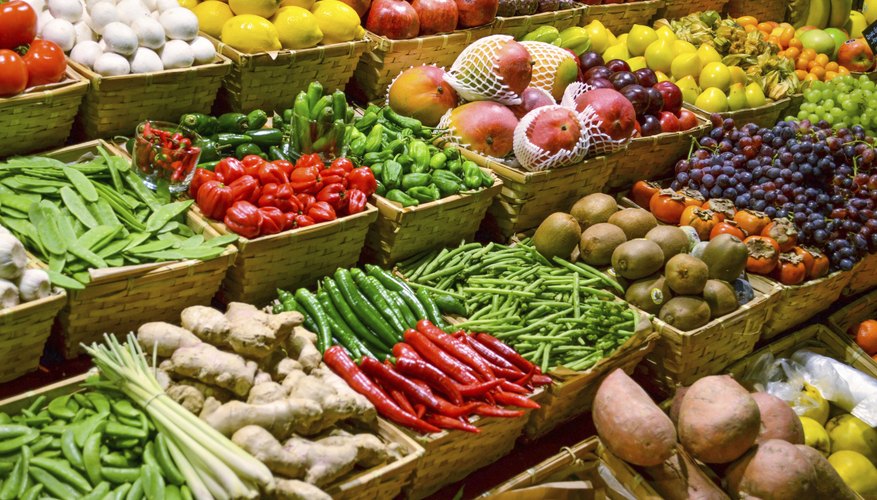 Fruit market with various colorful fresh fruits and vegetables