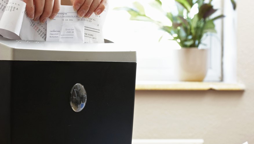 Photo Credit: Martin Poole/Digital Vision/Getty Images It's best to shred personal documents before recycling them.