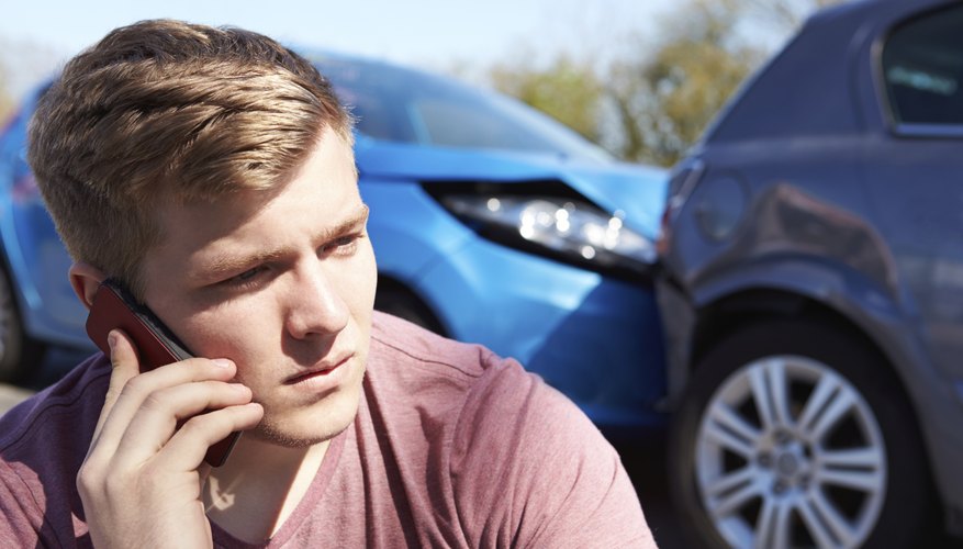 Driver Making Phone Call After Traffic Accident