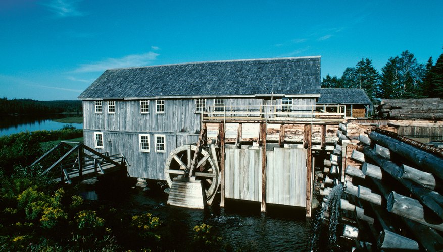 Photo Credit: Hemera Technologies/AbleStock.com/Getty Images Water wheel at a rustic lumber mill in Sherbrooke, Nova Scotia, Canada.