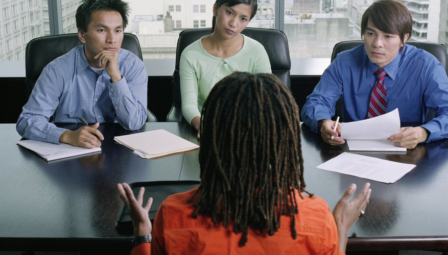 How To Start A Small Hr Consulting Company Bizfluent High Angle View Of Four Business Executives In A Meeting Human Resources Hr Consulting Companies Work With Small