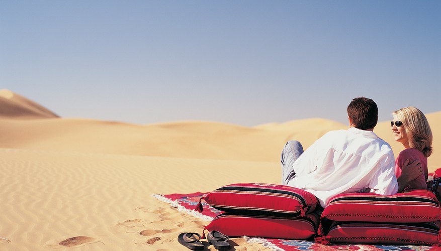 Photo Credit: Digital Vision./Photodisc/Getty Images Human activity may influence the ecological difficulties of desert life.