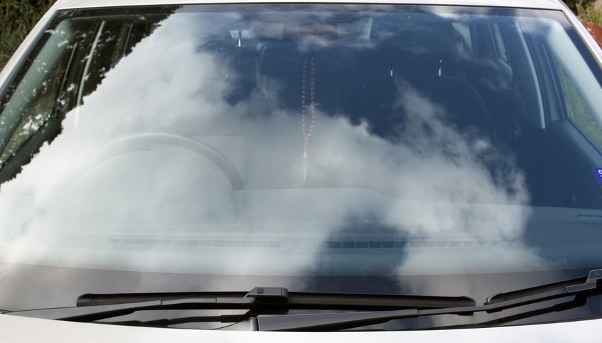 Front View Of Car Windshield And Windscreen Wiper Blades