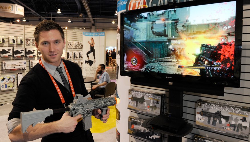 Cómo conectar un controlador de guitarra inalámbrico para Guitar Hero de PS3.