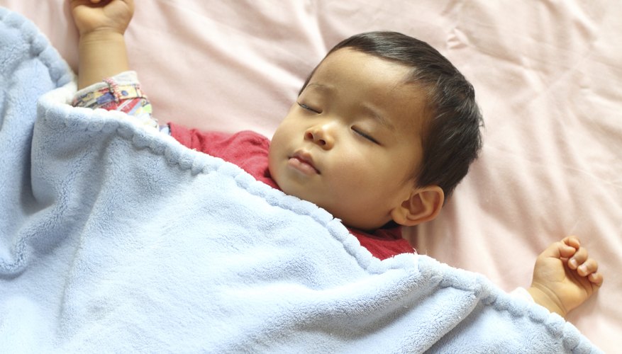 Boy sleeping with a blanket Boy sleeping with a blanket
