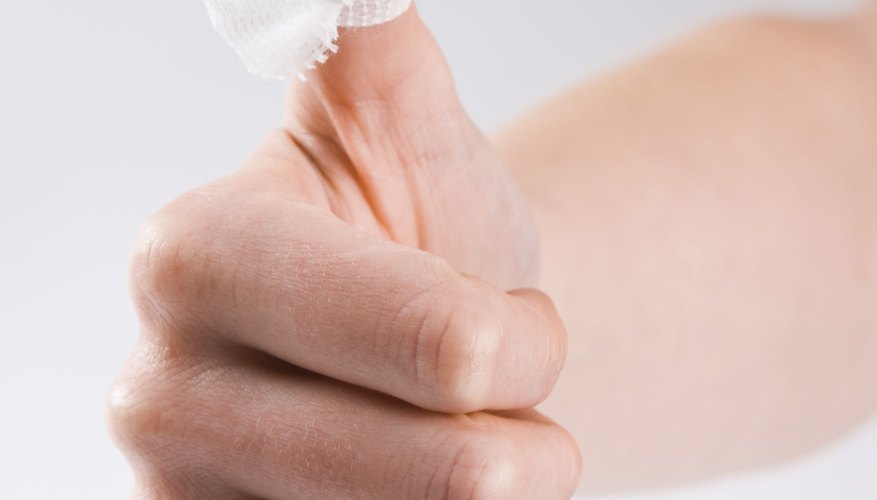 Thumb wrapped in bandage Thumb wrapped in bandage