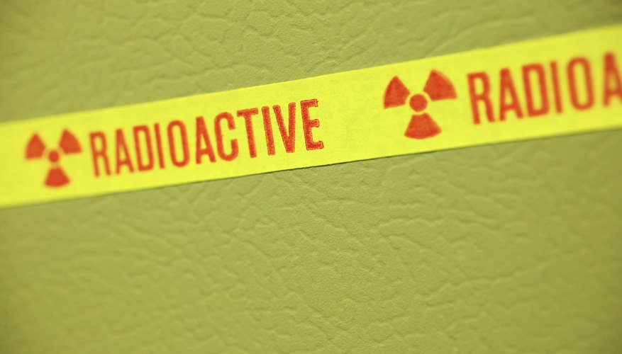 Photo Credit: Thinkstock/Stockbyte/Getty Images Damaging radiation is one of the primary risks of splitting an atom.