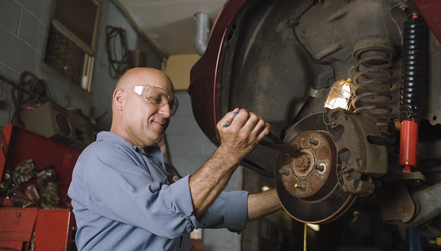 Mechanic fixing brakes