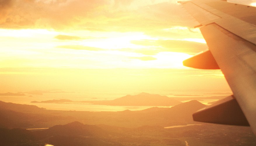 Photo Credit: John Foxx/Stockbyte/Getty Images Airplane emissions account for about 5 percent of global warming, according to the New York Times.