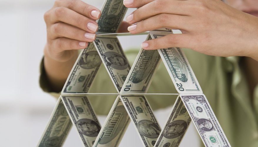 Photo Credit: Comstock Images/Stockbyte/Getty Images All the triangles in this card pyramid are congruent because their angles and sides are the same.