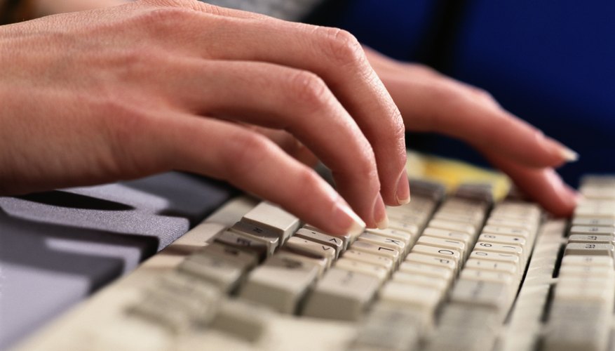 Close-Up of Hand on Keyboard
