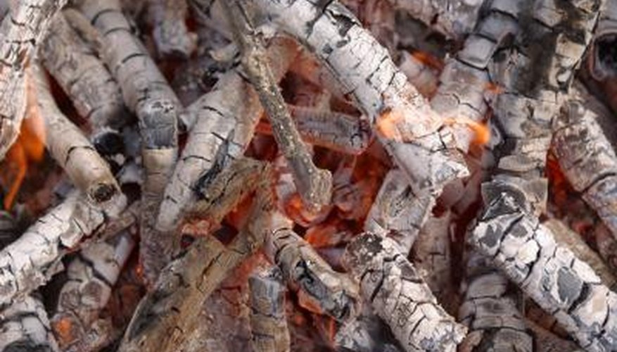 Photo Credit: Hemera Technologies/AbleStock.com/Getty Images The use of fuels such as wood affects the carbon cycle used by plants for respiration
