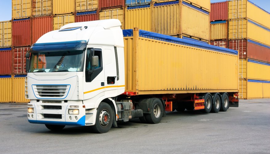 truck in harbor with containers