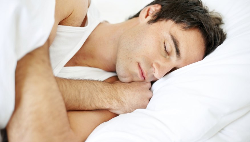 man resting in bed man resting in bed