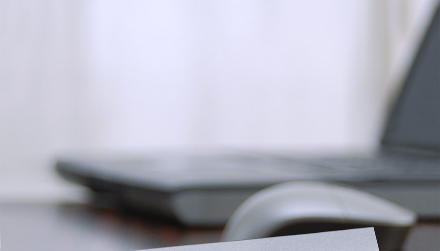 Photo Credit: ene/iStock/Getty Images Nameplate on desk.