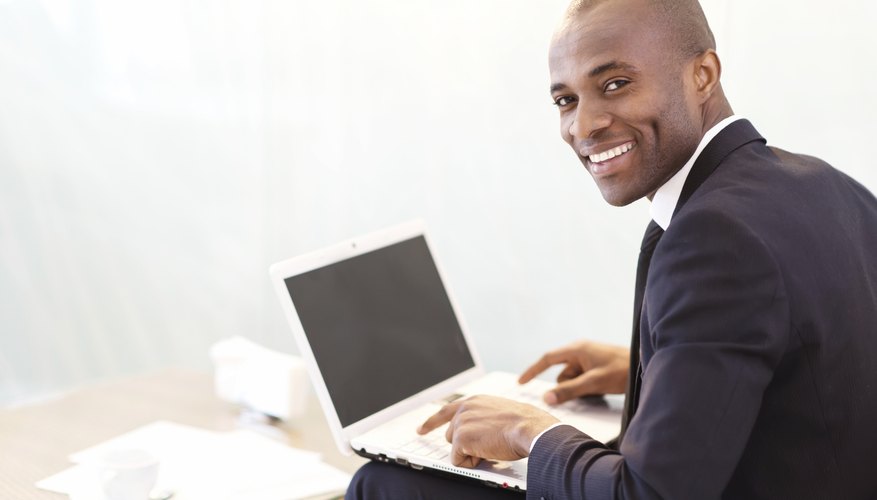 Businessman with laptop.