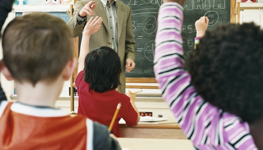 Photo Credit: Digital Vision./Photodisc/Getty Images Elementary school students can enjoy many fractions activities from the Smart Exchange.