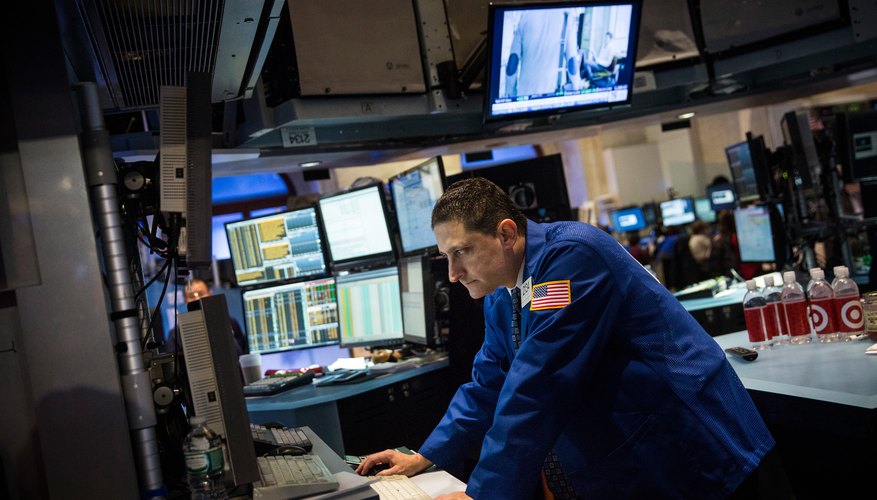 A trader works on the floor of the New York Stock Exchange