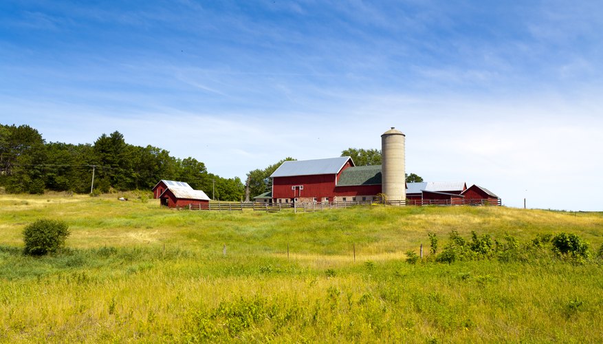 Farm in the middle of a field.