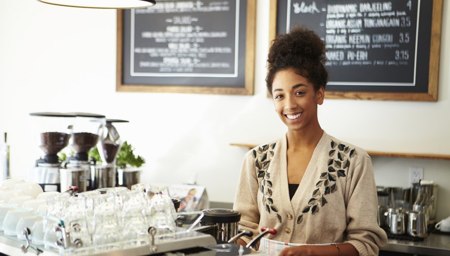 Female Owner In Coffee Shop
