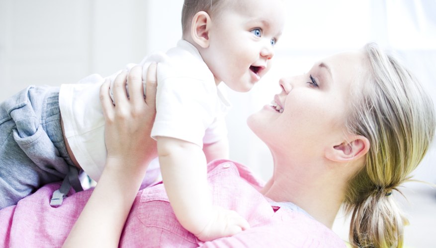Mother holding baby. Mother holding baby.