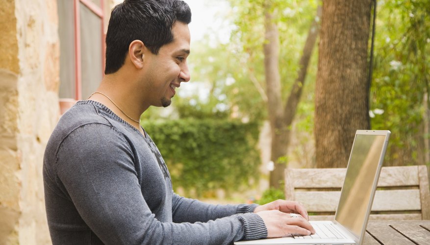 Photo Credit: Purestock/Purestock/Getty Images Man registering online