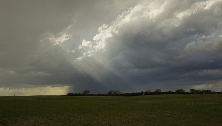 Rain clouds and rain in the distant horizon. Rain clouds and rain in the distant horizon.