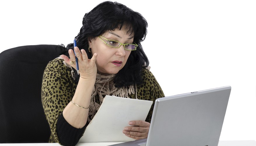 Woman takes online English conversation lesson