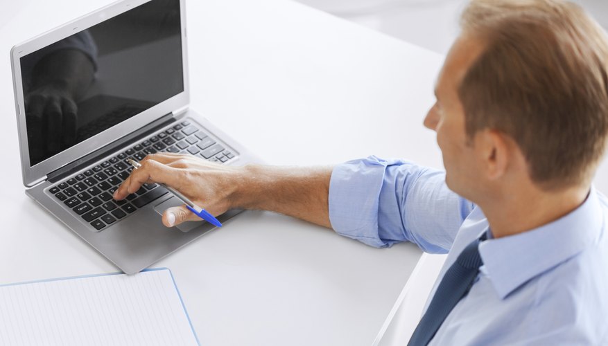 miling businessman working in office