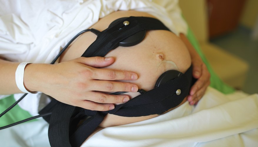 Photo Credit: joruba/iStock/Getty Images Pregnant woman in hospital with ultrasonic sensors over her belly