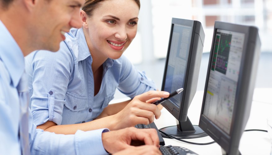 Photo Credit: Catherine Yeulet/iStock/Getty Images Look at performance management system documents.