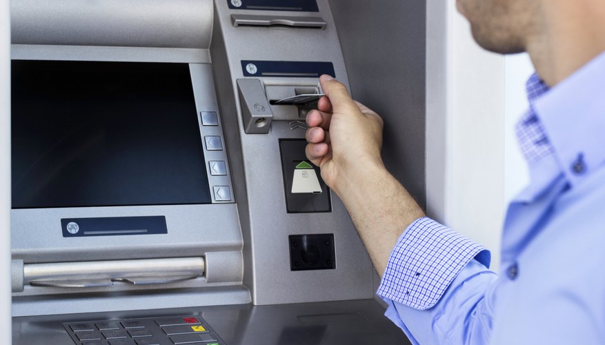Man using the ATM.