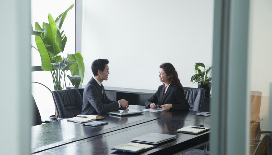 Co-workers in meeting room