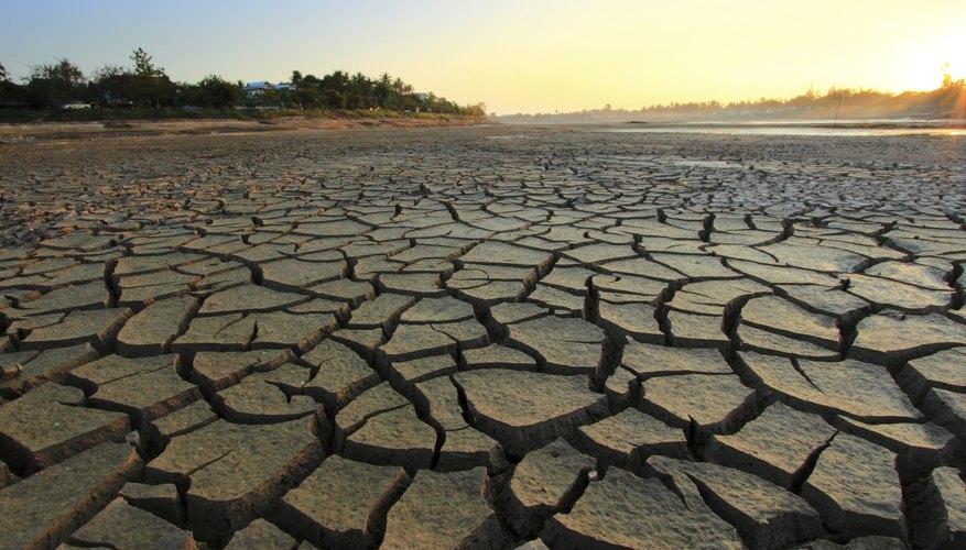 Photo Credit: Surachet1/iStock/Getty Images Dry, barren landscape with cracked earth