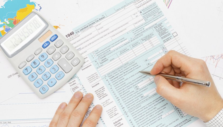 Filling out tax forms.