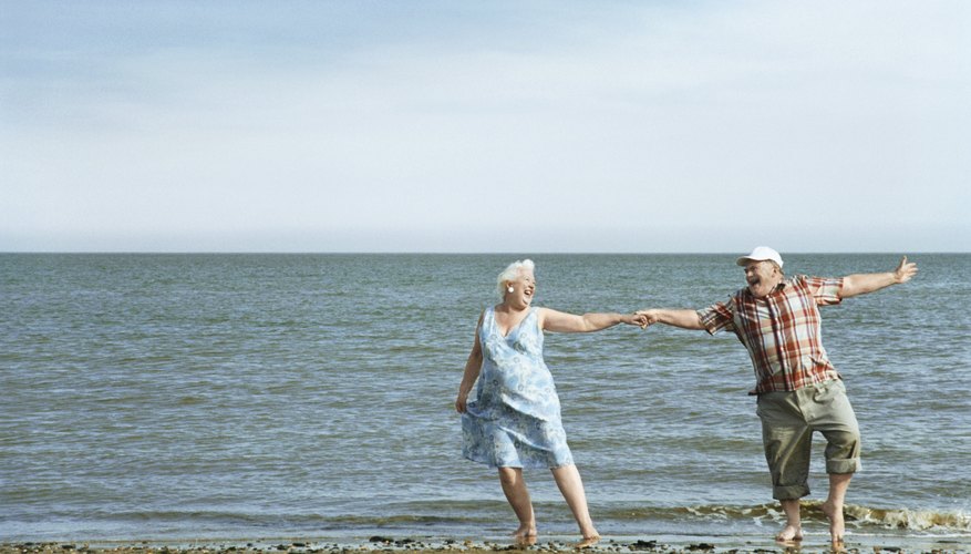 Senior Couple Dancing at Water's Edge