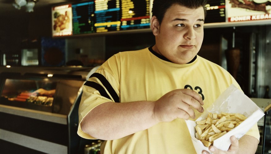 Man eating french fries Man eating french fries
