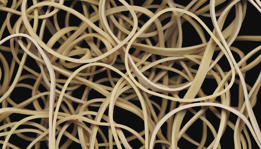 Photo Credit: Siri Stafford/Photodisc/Getty Images Stretch a rubber band between your fingers.