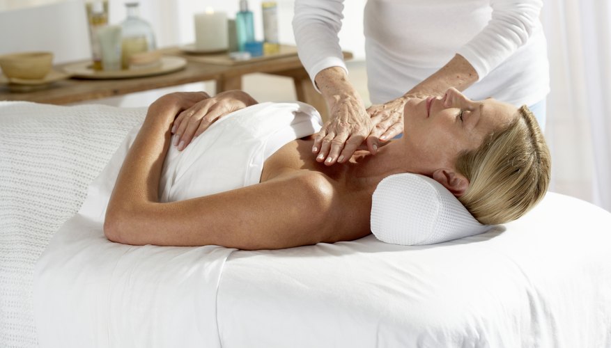 Woman laying on table having a massage