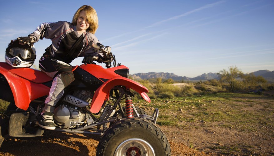 Boy posing on ATV, Arizona