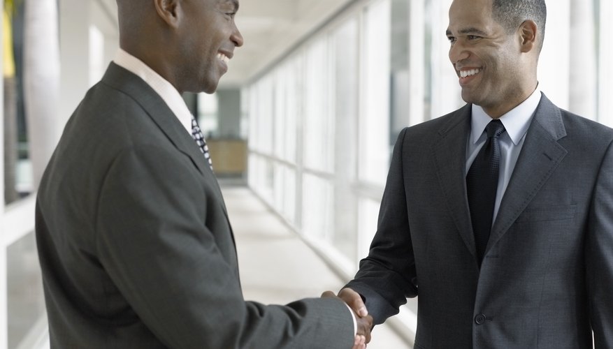 Happy Businessmen Shaking Hands