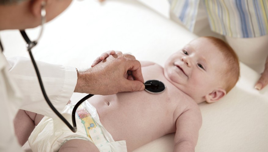 pediatrician examining baby pediatrician examining baby