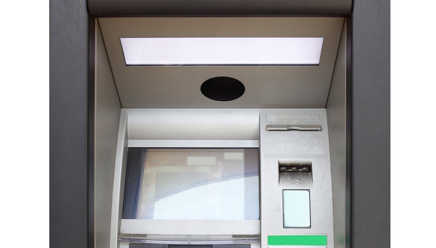 Photo Credit: Roman Sigaev/Hemera/Getty Images ATMs can be programmed to sell stamps as well.