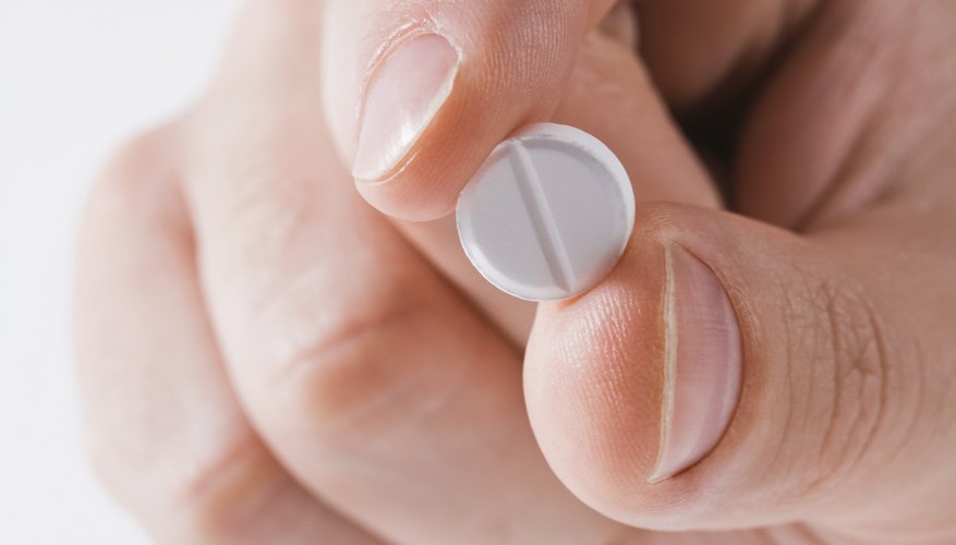 Man holding asprin Man holding asprin
