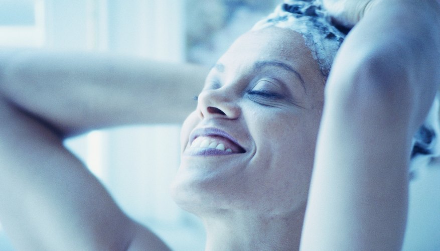 Photo Credit: Stockbyte/Stockbyte/Getty Images Most shampoos are weakly acidic -- less so than hair itself.